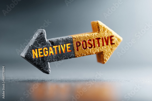 3D illustration of two stone arrows, one orange and one black, pointing in opposite directions. Labels 