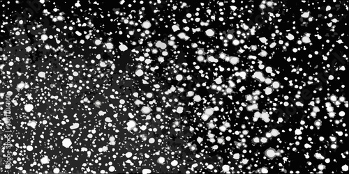 Abstract black and white speckled pattern resembling snowfall or static noise