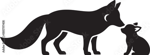 Silhouette of adult fox standing close to small fox kit in nature