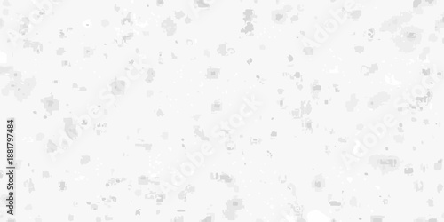 A close up view of a speckled white surface with gray and silver inclusions