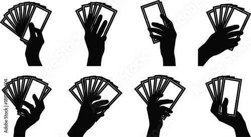 Silhouette of hands holding playing cards in various positions and gestures  holding cards