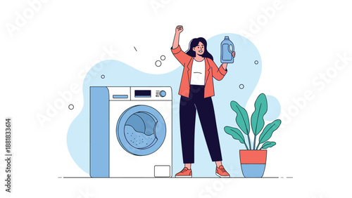 Happy young woman celebrating finishing housework and laundry while standing next to a washing machine in a clean bright room.