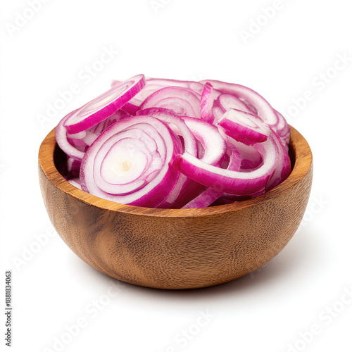 Fresh sliced red onion rings in wooden bowl, vivid