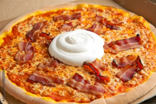 Gourmet Pizza with Bacon and Sour Cream on Delivery Box