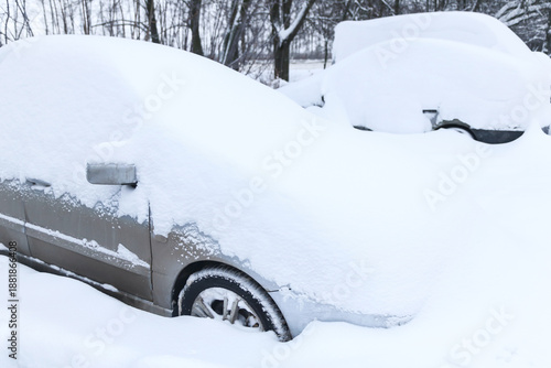 Wallpaper Mural Cars under snow in big snowbank close up after heavy snowfall blizzard. Car covered snow Torontodigital.ca