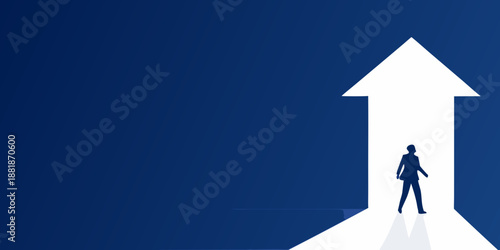 businessman standing on white arrow pointing upwards on blue background