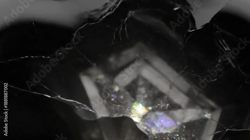 Wallpaper Mural Volcanic Glass Surface An abstract, close-up of a smooth obsidian or volcanic glass surface, with subtle, reflective shifts in its minimalist texture. Torontodigital.ca