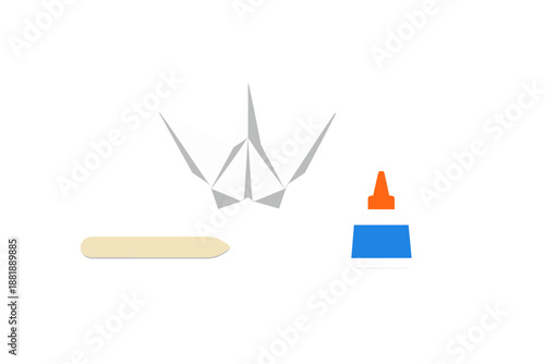 Crafting a paper crane with glue and a popsicle stick on a plain