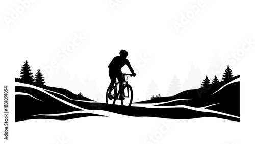 Silhouette of a cyclist riding a mountain bike in nature.