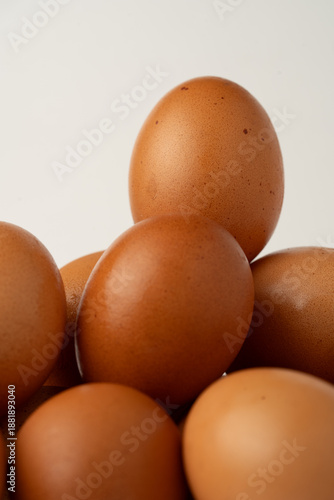 Stack of eggs on a white background