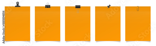 Set of large paper notes with binder clips, bulldog clip, paper clip and push pin. Orange sheets of paper. Black holders	