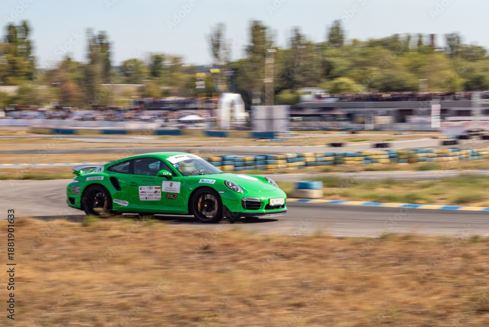 Obraz premium racing car. motorsport. circuit racing. dangerous moments on the track. high vehicle speed. sharp turn. demolition of wheels.