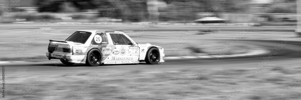Obraz premium racing car. motorsport. circuit racing. dangerous moments on the track. high vehicle speed. sharp turn. demolition of wheels.