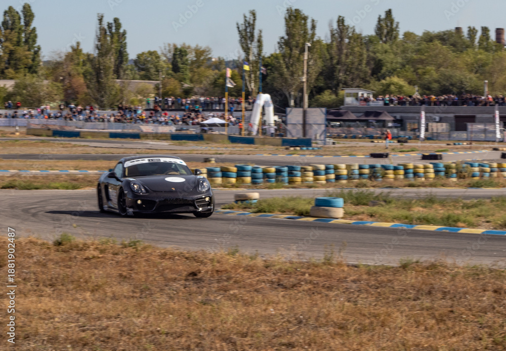 Obraz premium racing car. motorsport. circuit racing. dangerous moments on the track. high vehicle speed. sharp turn. demolition of wheels.