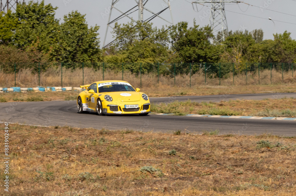 Obraz premium racing car. motorsport. circuit racing. dangerous moments on the track. high vehicle speed. sharp turn. demolition of wheels.