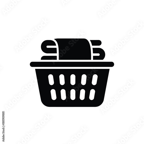 Vector illustration icon black laundry basket with rolled up clothes on top simple icon