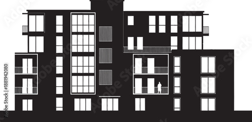 Modern apartment building architecture silhouette with large windows and balconies in urban cityscape setting at daytime