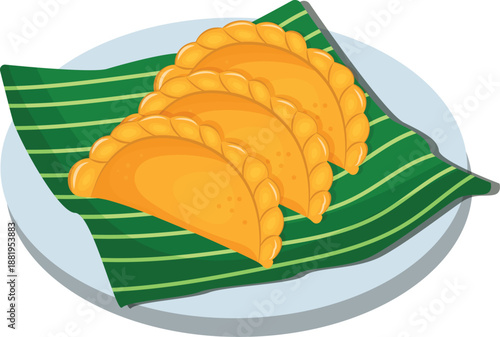 golden brown curry puff served on a banana traditional leaf 
