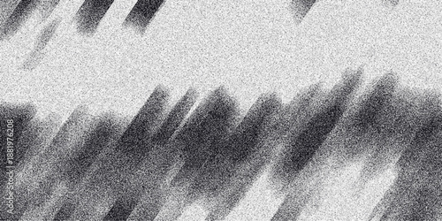 Dynamic abstract grayscale background with blurred diagonal streaks and a fine grainy texture, offering a sense of motion and artistic depth for creative applications