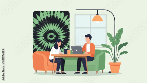 Two people work on laptops in a stylish room with artwork and plants