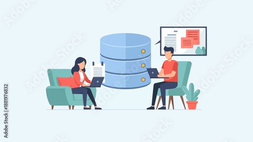 Two people work on laptops next to a database and presentation screen