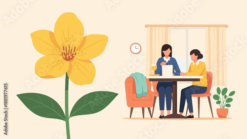 Two women in office attire sit at a table with a laptop, and a large yellow flower