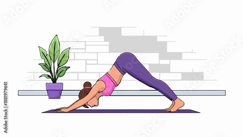 Woman in downward-facing dog pose indoors with potted plant and brick wall