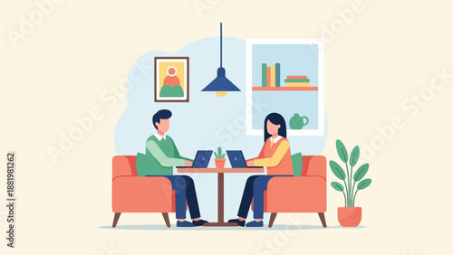 Two people work on laptops while sitting on sofas in a cafe