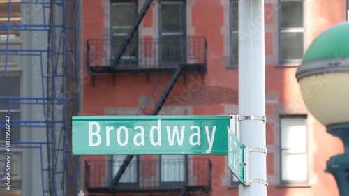 Wallpaper Mural New York City Broadway street sign in Manhattan Midtown, United States. Urban road sign, traffic sign. Building architecture in Flatiron district. Crossroad with 5 fifth avenue. Subway metro lamp. Torontodigital.ca