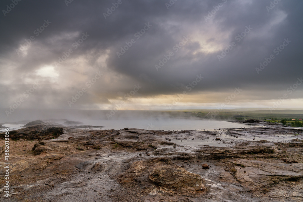 Obraz premium boiling and steaming geothermal pool in Geysir in the Haukadalur Valley in Iceland