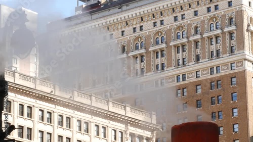 Wallpaper Mural New York City Manhattan Midtown Broadway street architecture, United States of America. Towers on Herald Square. Hot steam, lantern and historic building 1912. Iconic brick skyscraper thru vapor smoke Torontodigital.ca