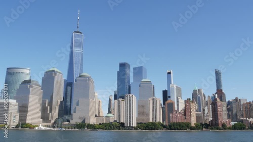 Wallpaper Mural New York City Manhattan Downtown Financial District skyline, World Trade Center tower from ferry boat to New Jersey, United States of America. River waterfront urban cityscape with skyscraper building Torontodigital.ca