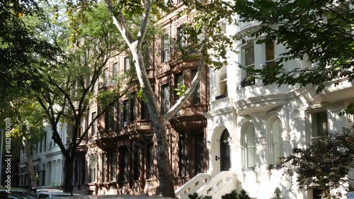 Wallpaper Mural New York City townhouse buildings, brownstone row houses in Manhattan or Brooklyn, United States of America. Classic buildings on residential district street. Real estate property. Rowhouse townhome. Torontodigital.ca