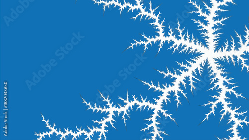 A fractal pattern resembling a snowflake or intricate design on a blue background from a close-up viewpoint