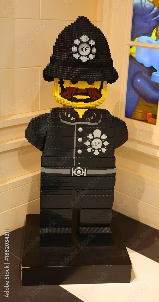 Fototapeta premium LONDON UNITED KINGDOM 06 19 2023: Lego Police Policeman Minifigure Officer Constable Boy Man Flesh Skin Beard
