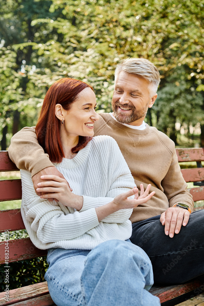 Fototapeta premium Couple enjoying a joyful moment together in a vibrant spring park setting