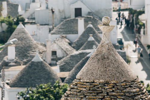 Alberobello, Italy, famous for its unique trulli architecture. Trulli are traditional, small, dry-stone limestone dwellings with distinctive conical roofs. 
