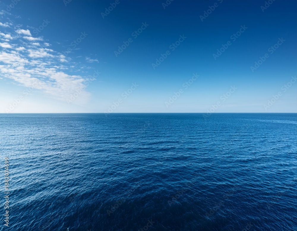 Obraz premium vast expanse of deep blue water calm sky horizon line