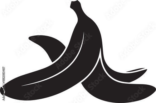 Large banana peel hazard element lying on the ground black vector silhouette illustration line art graphic