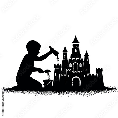 A silhouette of a child building a sandcastle on a beach