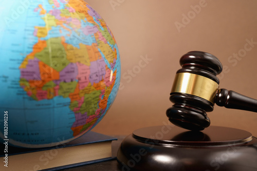 International Law Business And Global Justice Concept With A World Map Globe And A Judge Gavel