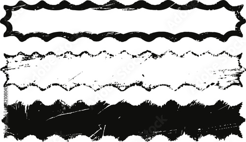 Set of four grunge torn paper edges in black and white with rough, jagged, and distressed textures