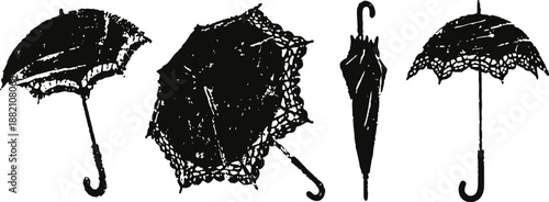 vintage black lace umbrellas in various open and closed positions with curved handles