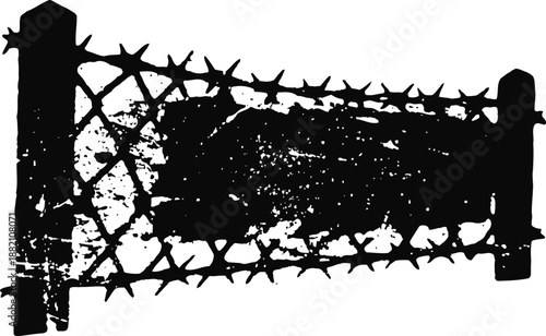 Old rusty barbed wire fence silhouette with sharp pointed spikes and weathered wooden posts