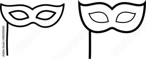 Two black and white carnival masks on sticks masquerade