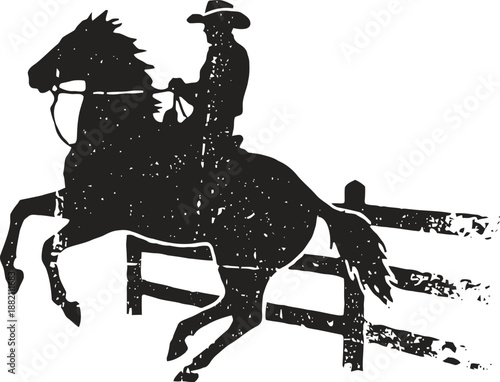 Silhouette of cowboy riding horse jumping over fence, western ranch scene