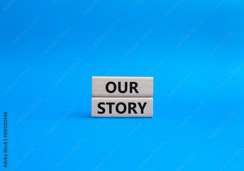 Obraz premium Our story symbol. Wooden blocks with words Our story Beautiful blue background. Business and Our story concept. Copy space.