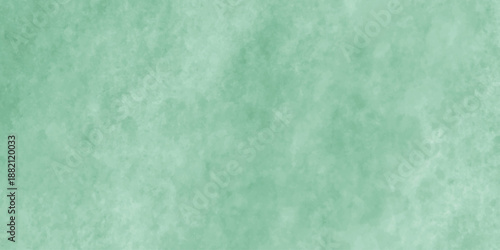 Abstract Elegant dark green background with mottled vintage texture in old fancy background design, texture of colored parchment paper.