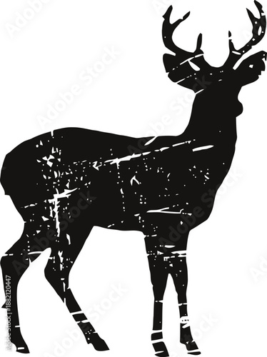 Grunge black deer silhouette with antlers standing in profile on white background