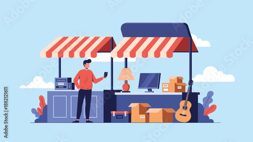 Man stands at a busy flea market stall filled with miscellaneous used items like home electronics, a guitar, and cardboard boxes.